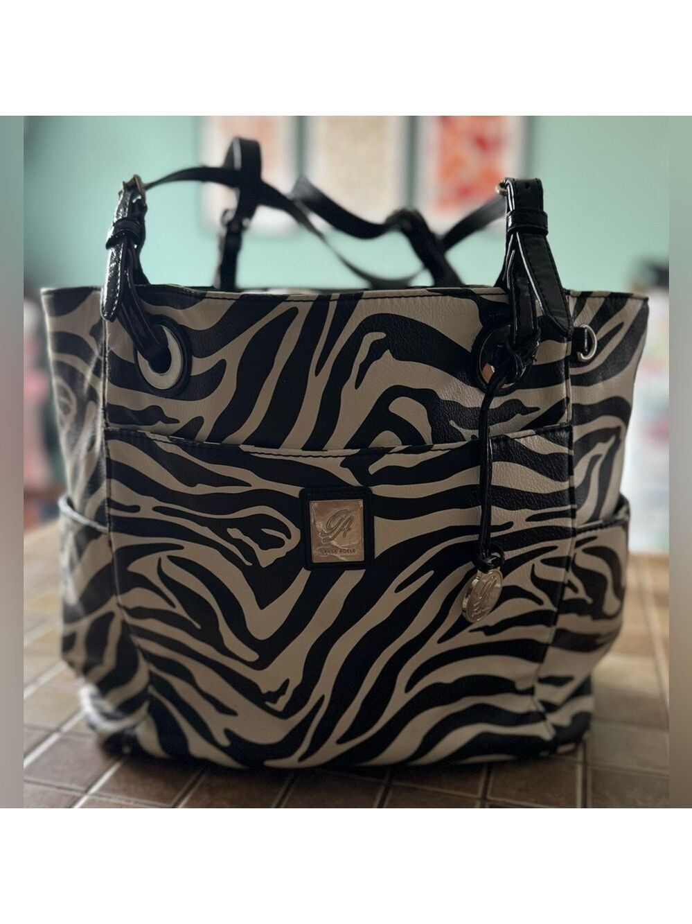 Elevate Your Style with Grace Adele's Zebra Print Black and White Purse